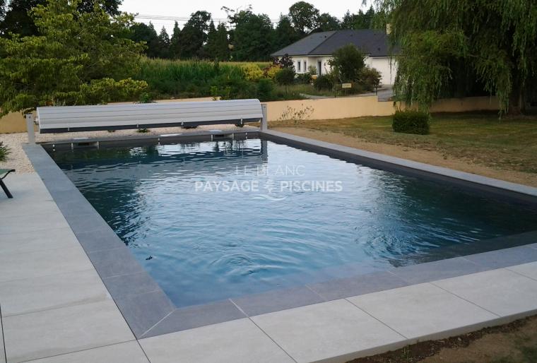 Réalisation piscine traditionnelle EVERBLUE et Aménagements par le blanc paysage et piscines GER 64 et 65