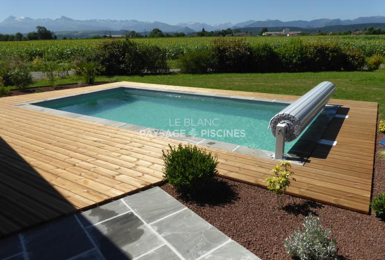 Piscine traditionnelle - dallage - aménagements paysagers - OSSUN 65 -